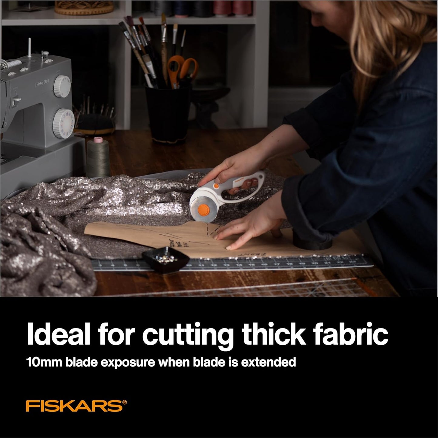Fiskars 60mm Rotary Cutter for Fabric with Ergonomic Loop Grip And Comfort Handle, Titanium Rotary Fabric Cutter for Thick Materials, Easy and Safe Blade Change, Sewing Supplies and Quilting Tools