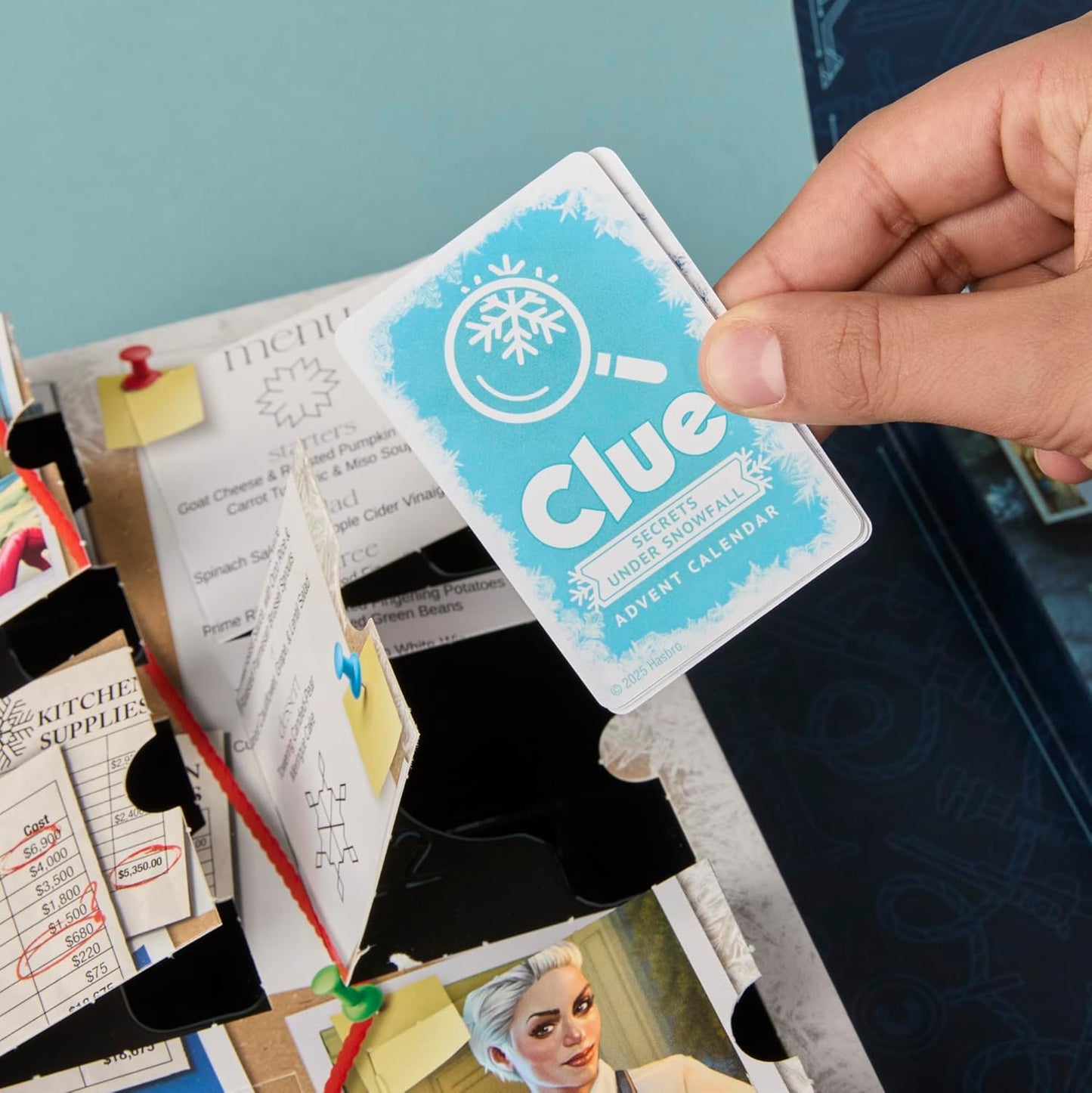 Clue Advent Calendar: Secrets Under Snowfall | 24 Days | Family Mystery Games | with 6 Winter-Themed Tokens and Surprise | Ages 10+ | 1+ Players